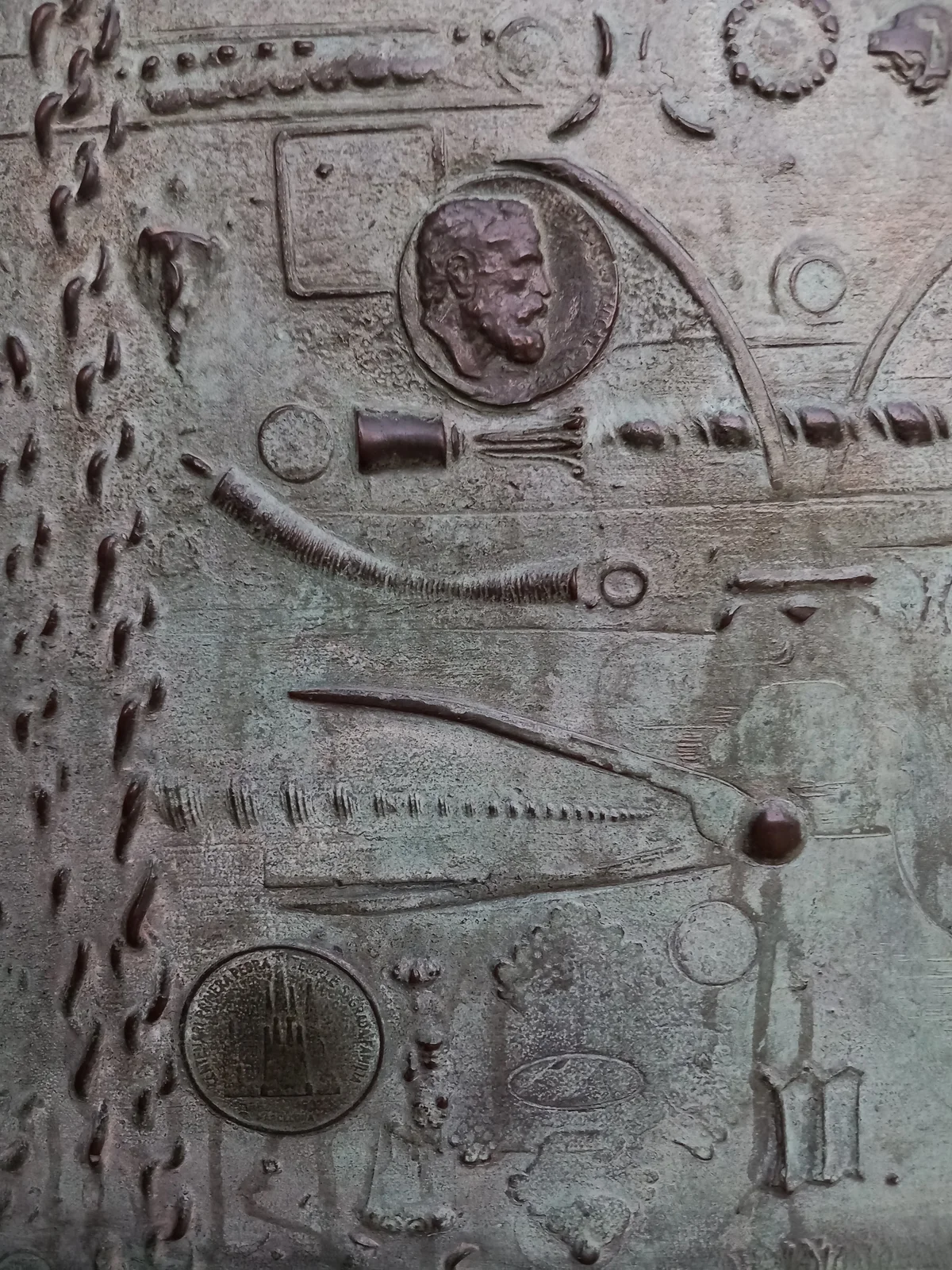 Bas-relief of Antonio Gaudi on the door of the Sagrada Familia (Barcelona)