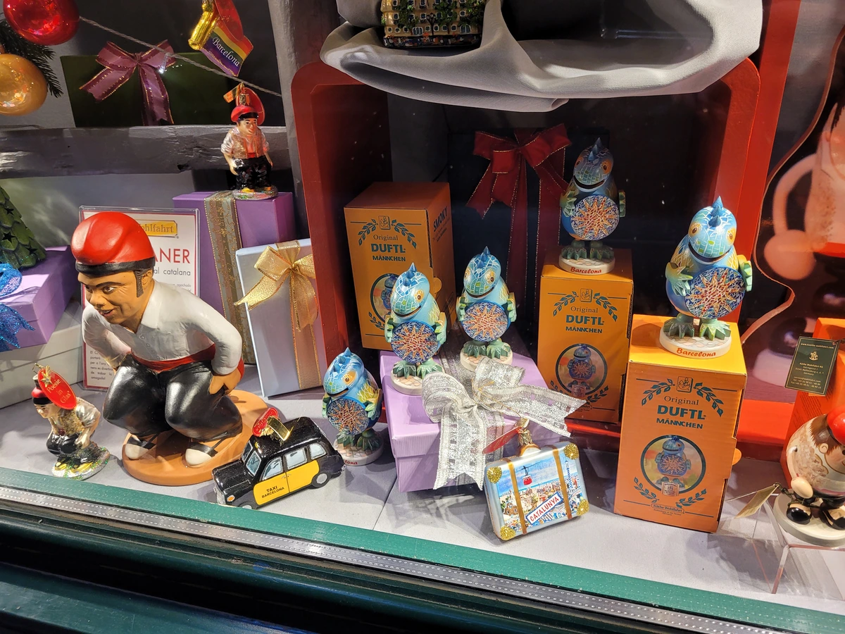 Traditional Caganer figurine in a Catalan nativity scene