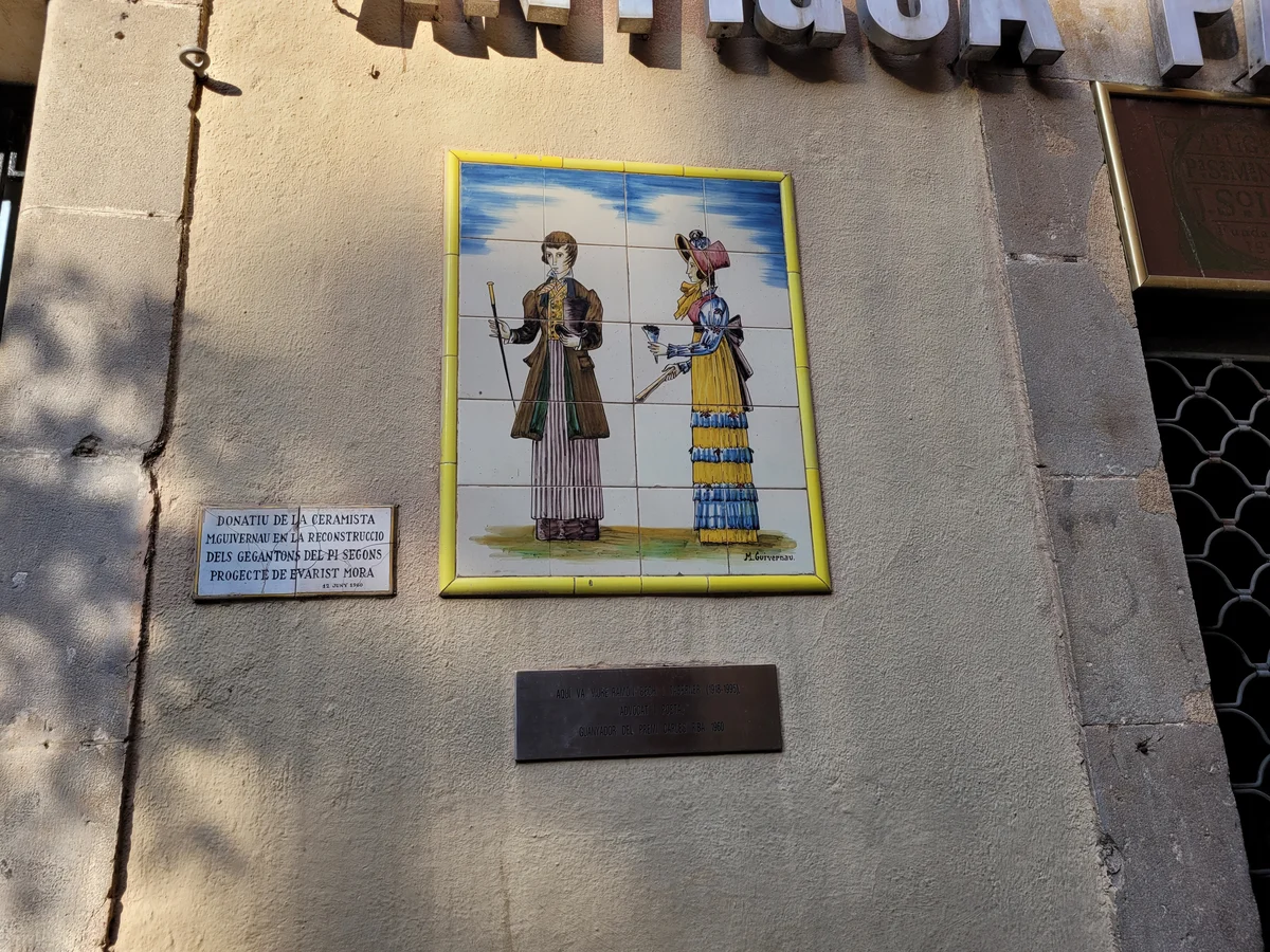 Catalonian festival Giants on decor tile in Barcelona Gotic Quarter