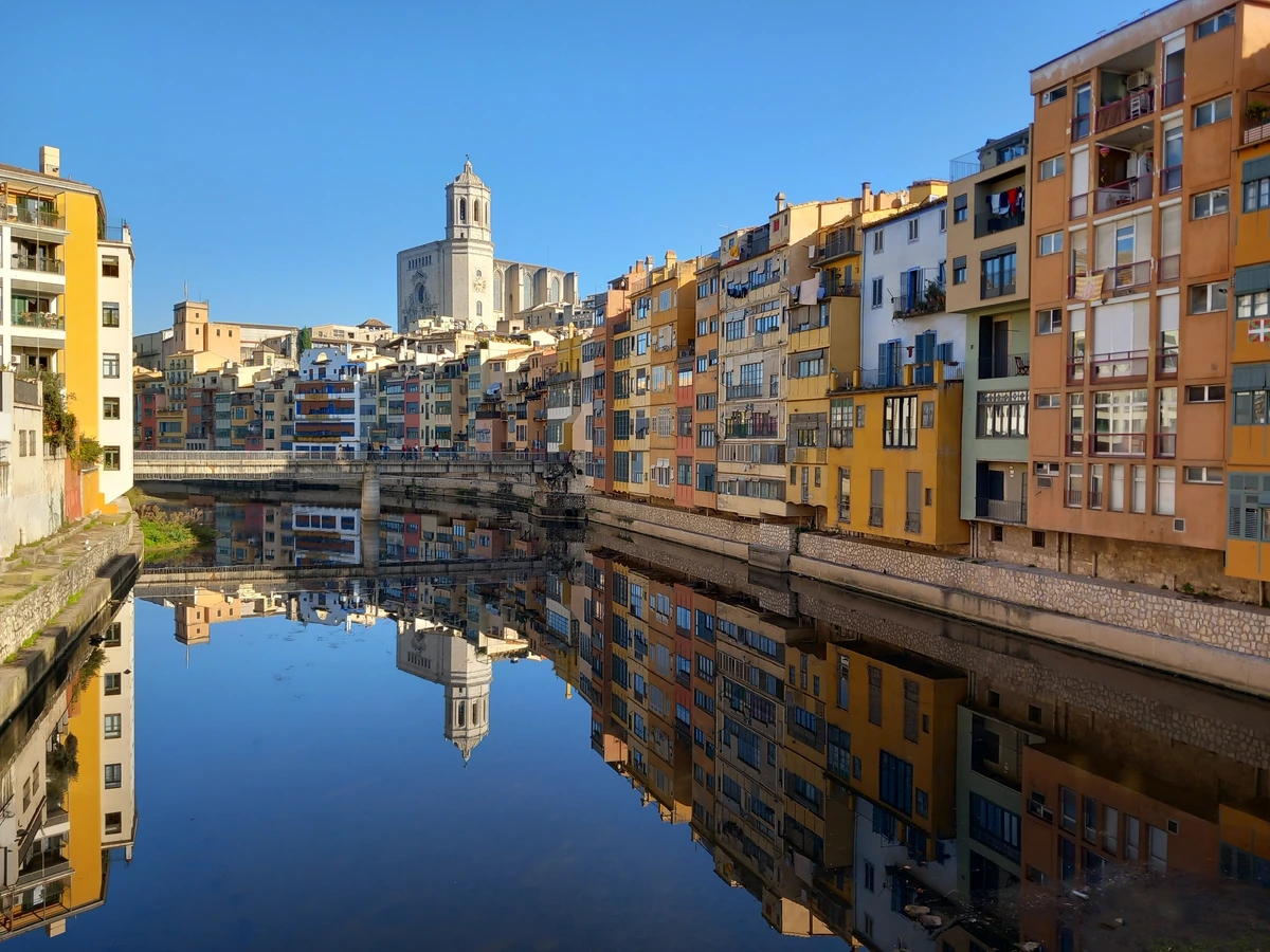 Girona, Spain – colorful houses along the Onyar River and historic bridges